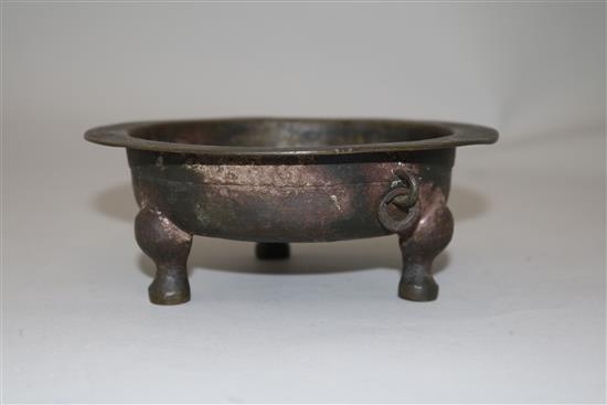 A Chinese archaic bronze tripod vessel, 15.5cm